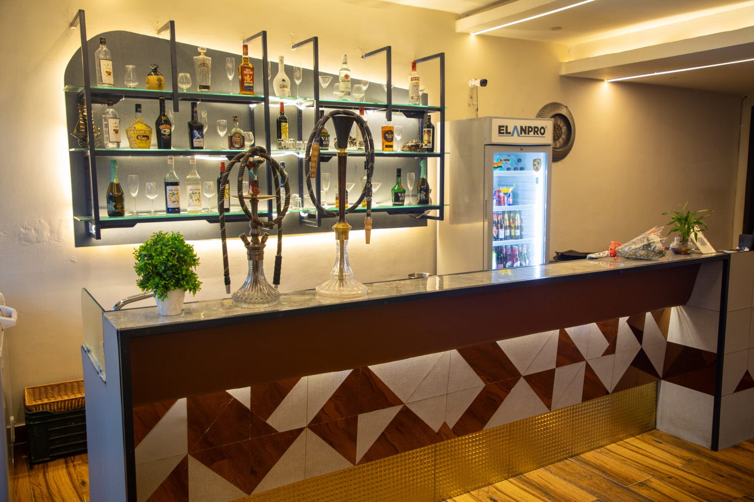 Bar counter with bottles on display