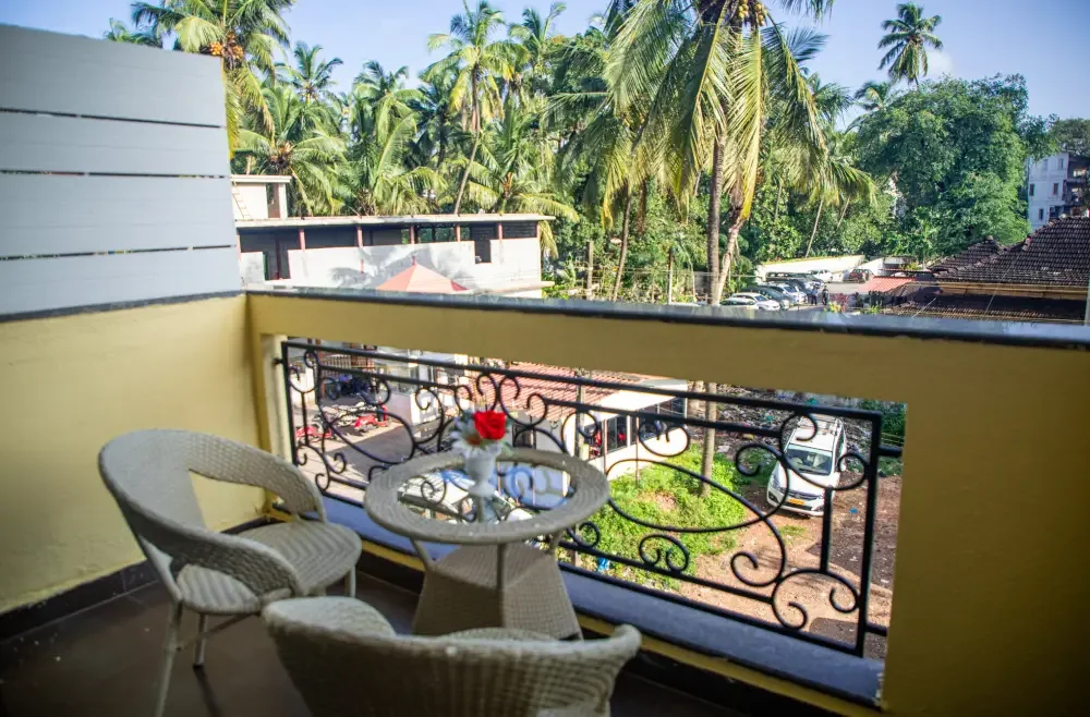 Deluxe City View balcony above the palms
