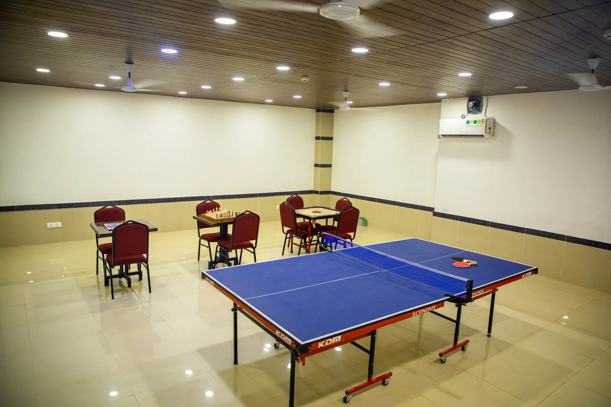 Air-conditioned game zone with a table tennis table and games tables